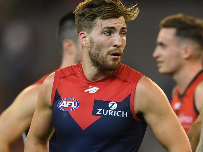 Jack Viney (left) and Nathan Jones of the Demons react after the Round 3 AFL match between the Melbourne Demons and the Essendon Bombers at the MCG in Melbourne, Friday, April 5, 2019. (AAP Image/Julian Smith) NO ARCHIVING, EDITORIAL USE ONLY