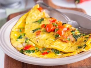 Homemade Vegetable Omelet with Tomato, Broccoli, Spinach, Onion and Red Bell Pepper