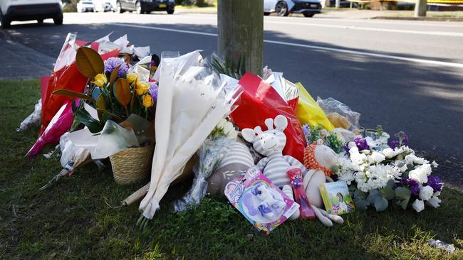 Other members of the community and school friends of the family, visited the growing shrine of flowers and written tributes for the children and their mother. Picture: Richard Dobson