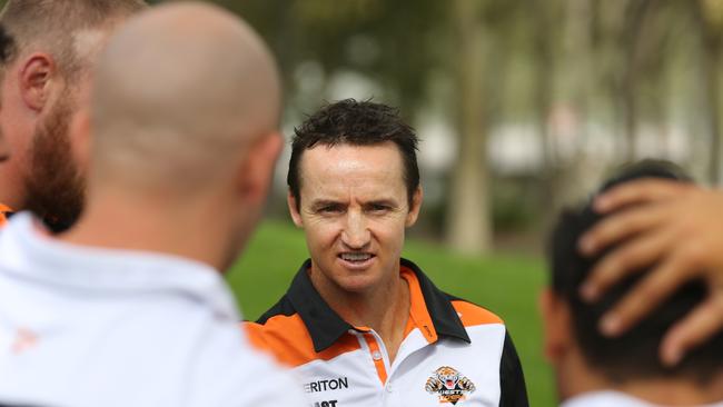 Wests Tigers coach Jason Taylor with players.