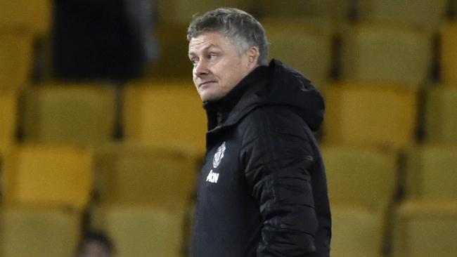 Manchester United's manager Ole Gunnar Solskjaer leaves the field at the end of the English FA Cup third round soccer match between Wolverhampton Wanderers and Manchester United at the Molineux Stadium in Wolverhampton, England, Saturday, Jan. 4, 2020. (AP Photo/Rui Vieira)