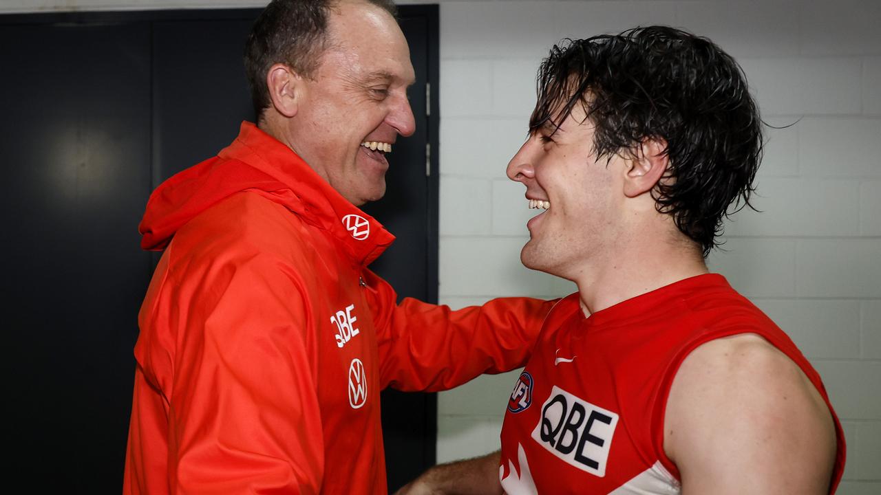 Swans coach John Longmire with Errol Gulden after the Swans’ win. Picture: Phil Hillyard