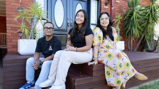 Melati and Agus Ramdhana, with daughter Mahes 14, are looking to upsize in Seven Hills but said it was tough. Picture: Tim Hunter.