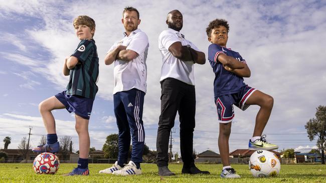 Tim Quinn and Peter Mazalla – pictured with their kids Fred and Zion – want to give kids a chance to play soccer. Picture: Kelly Barnes