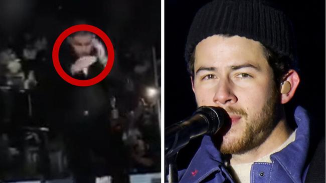 Nick Jonas was filmed fleeing the stage in Prague after a security scare.