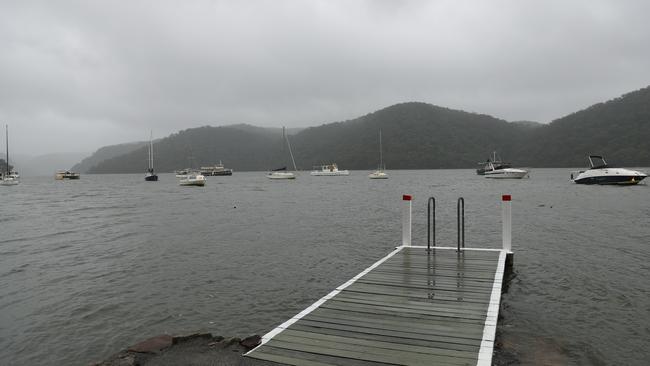 SES and RFS members have been searching waterways near Mooney Mooney for the missing 13 year old boy. Picture John Grainger
