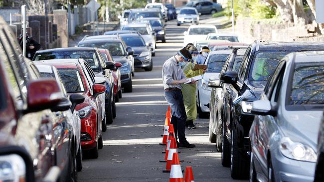 Medical workers test residents for the coronavirus in Balmain in Sydney’s inner west on Friday. Picture: Nikki Short