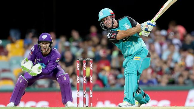 Chris Lynn of the Heat hits six runs during the BBL game between the Brisbane Heat and the Hobart Hurricanes. Pic Darren England
