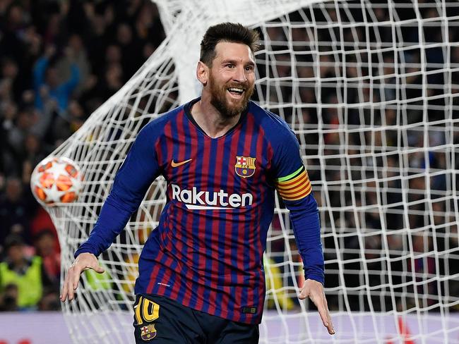 TOPSHOT - Barcelona's Argentinian forward Lionel Messi celebrates after scoring a goal during the UEFA Champions League semi-final first leg football match between Barcelona and Liverpool at the Camp Nou Stadium in Barcelona on May 1, 2019. (Photo by LLUIS GENE / AFP)