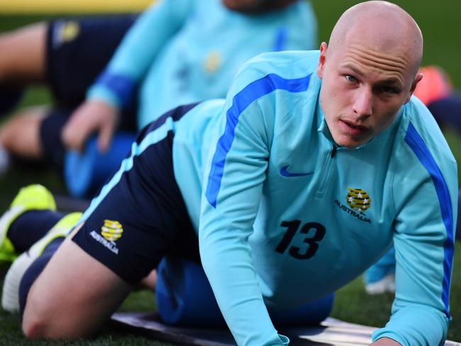 ADELAIDE, AUSTRALIA - JUNE 07: Aaron Mooy of Australia stretches during the Australian Socceroos training session at the Adelaide Oval on June 7, 2017 in Adelaide, Australia.  (Photo by Daniel Kalisz/Getty Images)