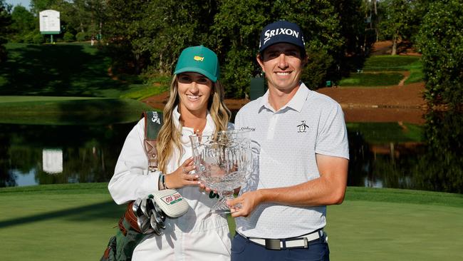 Nicolas Echavarria of Colombia poses with his girlfriend and caddie, Claudia De Antonio, alongside the Par Three Contest trophy following his victory. Echavarria’s grandfather began taking him to the golf course when he was just two years old, sparking his early passion for the sport. Claudia played collegiate golf at Louisiana State. Picture: AFP