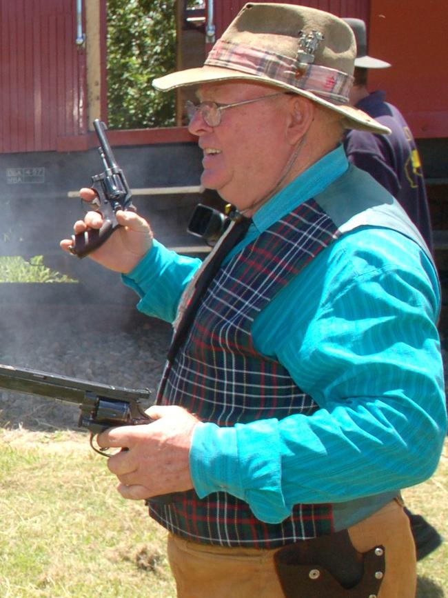 Murderer Philip Scott with guns, pictured at the Mary Valley Rattler.