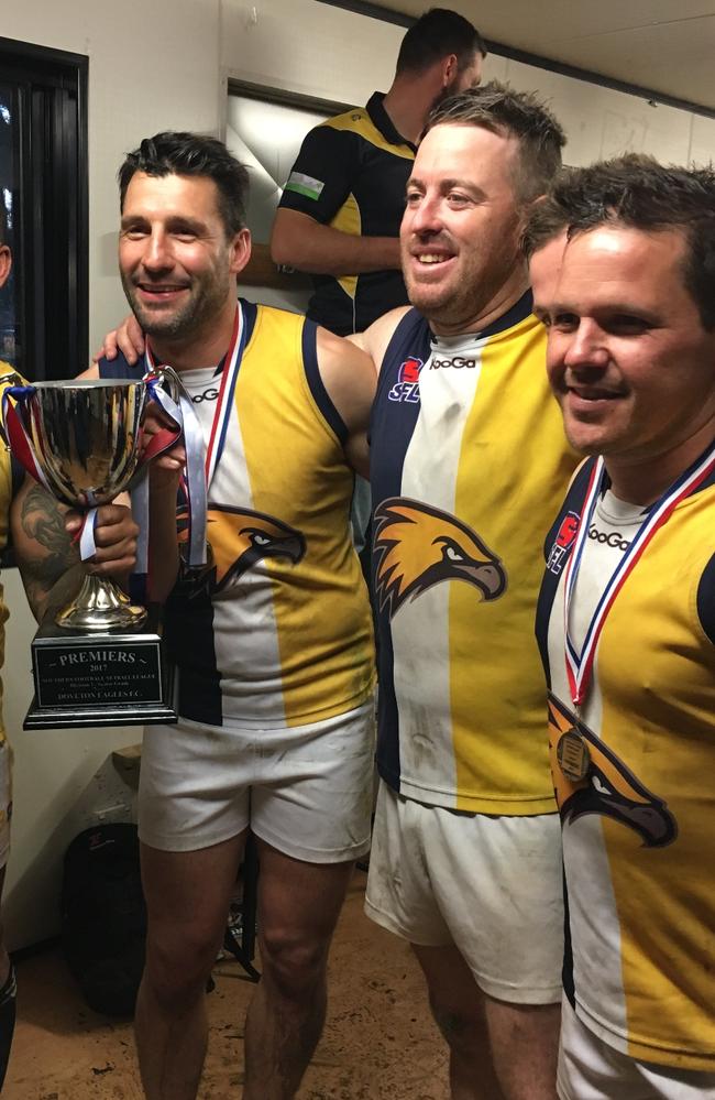 Russell Robertson celebrates Doveton Eagles’ premiership.