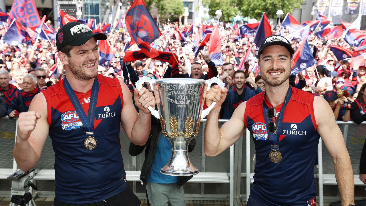 Angus Brayshaw and Alex Neal-Bullen of the Demons hold the premiership cup. Photo by Michael Klein.