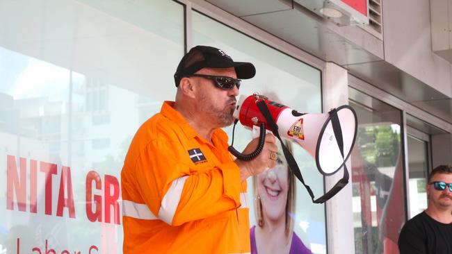 Electrical Trades Union Far Northern organiser Rob Hill makes a rousing address in front of Nita Green's Lake St office. Picture: Peter Carruthers