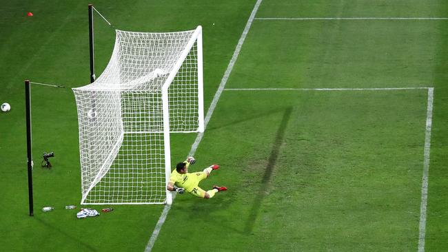 Jamie Young attempts to stop a free kick taken by star signing Alessandro Diamanti.