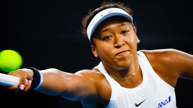 Naomi Osaka stretches for a return during her semi-final against Karolina Pliskova at the Brisbane International. Picture: AFP