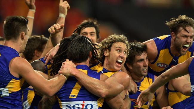 Nic Naitanui is mobbed by teammates. Picture: Getty Images