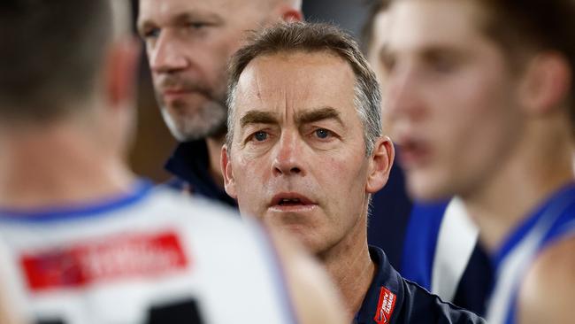 MELBOURNE, AUSTRALIA - AUG 18: Alastair Clarkson, Senior Coach of the Kangaroos addresses his players during the 2024 AFL Round 23 match between the Western Bulldogs and the North Melbourne Kangaroos at Marvel Stadium on August 18, 2024 in Melbourne, Australia. (Photo by Michael Willson/AFL Photos via Getty Images)