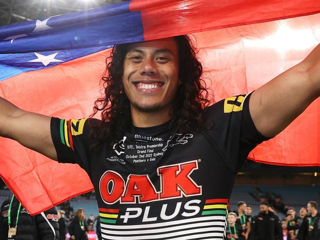 SYDNEY, AUSTRALIA - OCTOBER 02:  Jarome Luai of the Panthers celebrates with the Samoa flag after victory in the 2022 NRL Grand Final match between the Penrith Panthers and the Parramatta Eels at Accor Stadium on October 02, 2022, in Sydney, Australia. (Photo by Mark Kolbe/Getty Images)