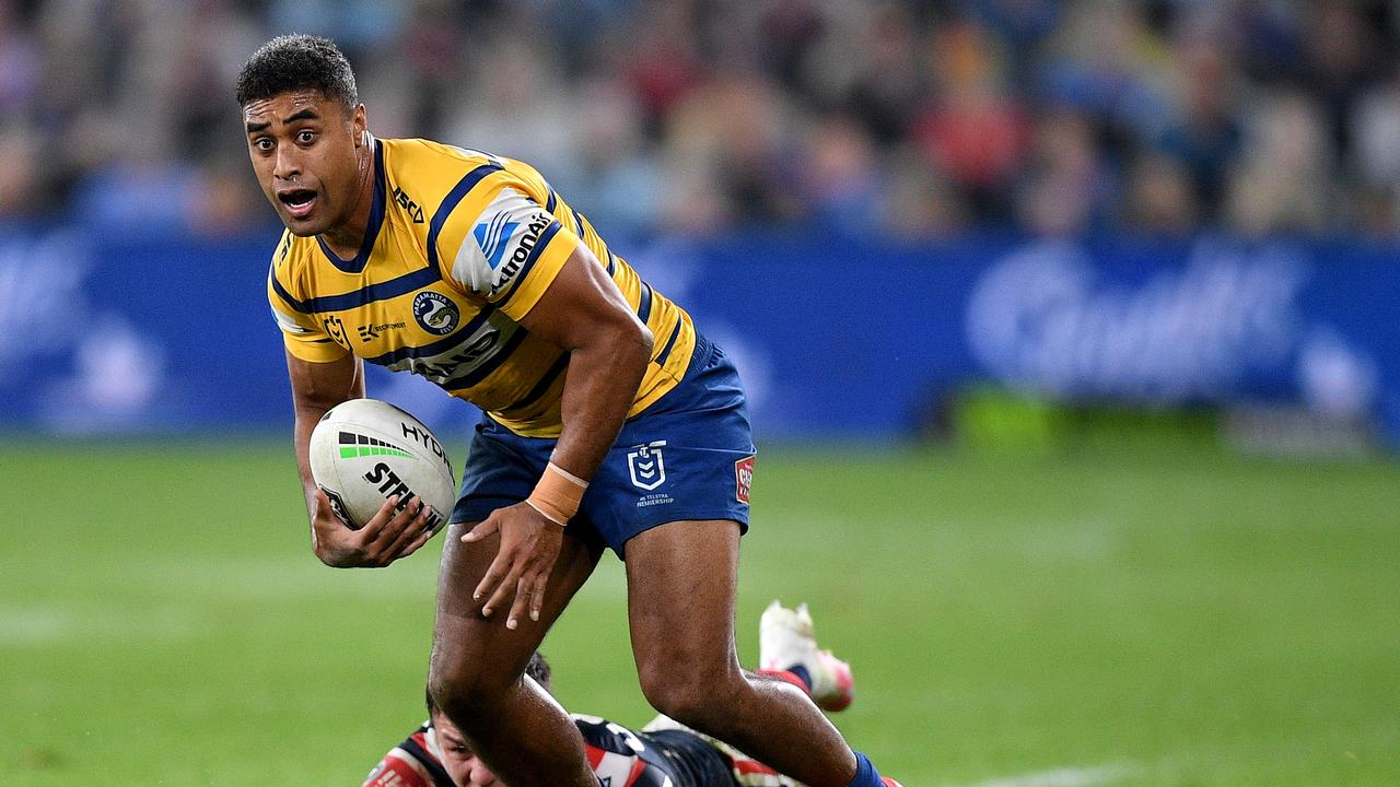 Michael Jennings of the Eels evaded a tackle by Joseph Manu of the Roosters during the Round 6 NRL match between the Sydney Roosters and the Parramatta Eels at Bankwest Stadium in Sydney, Saturday, June 20, 2020. (AAP Image/Dan Himbrechts) NO ARCHIVING, EDITORIAL USE ONLY