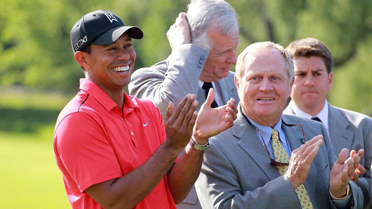 Tiger Woods shares a laugh with Jack Nicklaus.
