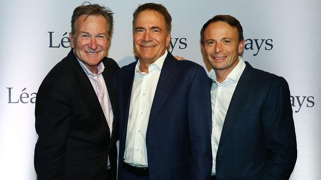 Mark McInnes, Brett Blundy and retailer Ray Itaoui at Sydney’s Aria restaurant. Picture: John Feder