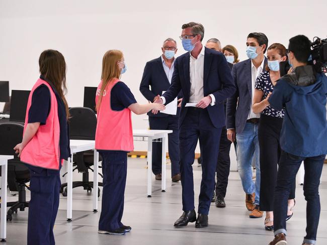 Mr Perrottet met with health workers at the Granville Centre vaccination clinic in Sydney. Picture: NCA NewsWire / Flavio Brancaleone