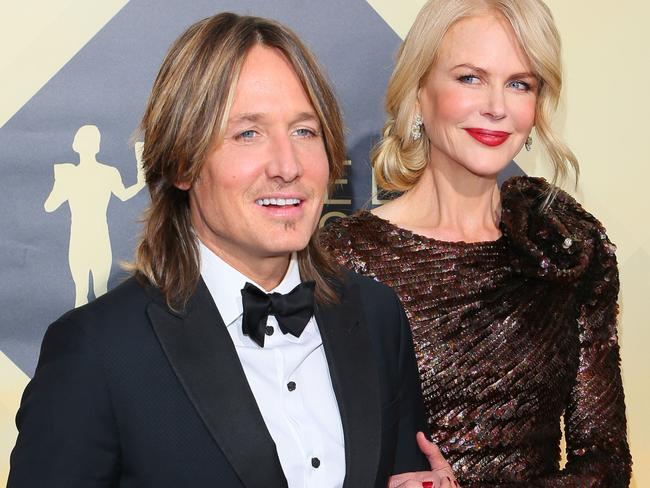 While on tour in Australia, Keith Urban, his wife Nicole Kidman, and their two children Sunday and Faith will enjoy a family holiday. Picture: AFP