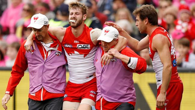 Nick Smith (right) consoles Alex Johnson on Sunday before he too joined the injured list. Pic: Getty Images