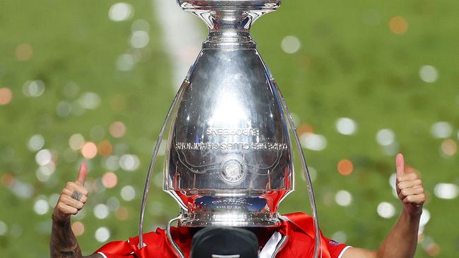 Bayern Munich defender Lucas Hernandez poses with the trophy upside down on his head after Bayern won the Champions League final in Lisbon. Picture: AFP