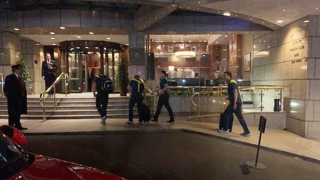 Australian players arrive at their London hotel.