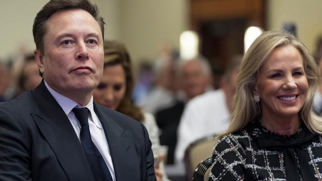 Elon Musk listens to Mr Trump’s barbs about him in Washington on Wednesday. (AP Photo/Alex Brandon)