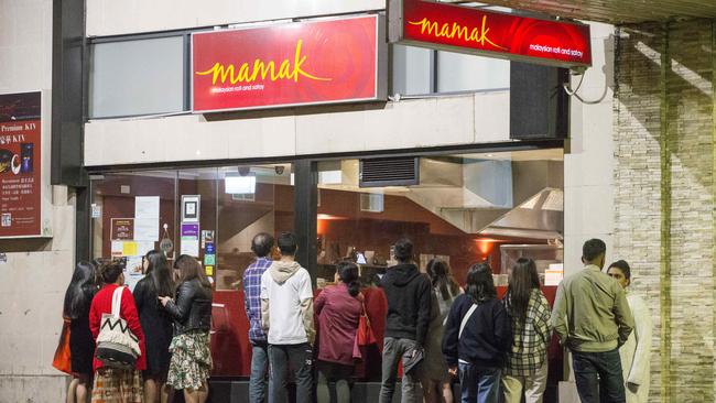 People outside Mamak restaurant on Goulburn Street. Picture by Damian Shaw