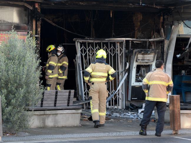 Firefighters at the scene on Monday. Picture: Andrew Henshaw