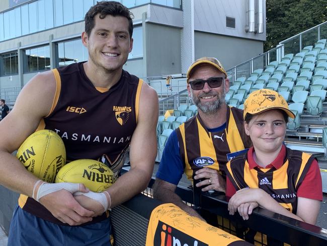 Lloyd Meek catches up with Hawthorn fans at a training session at UTAS Stadium before their pre-season clash with Collingwood earlier this month. Picture: Jon Tuxworth