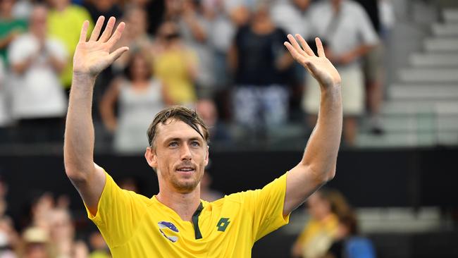 John Millman celebrates his win over Felix Auger-Aliassime. Picture: AAP