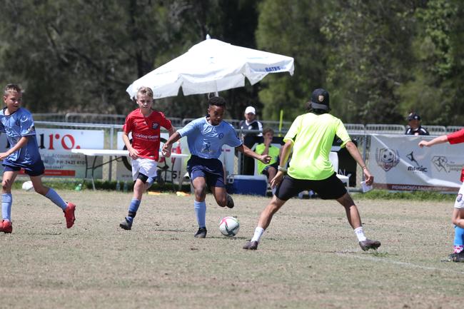 The Premier Invitational football tournament on the Gold Coast. Gold Coast Knights Red v Springfield United under-13s in action. Picture: Mike Batterham.