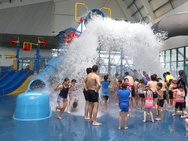 People getting soaked by the tipping bucket at the Splash Aquatic Centre in 2017. Picture: Hamish Blair