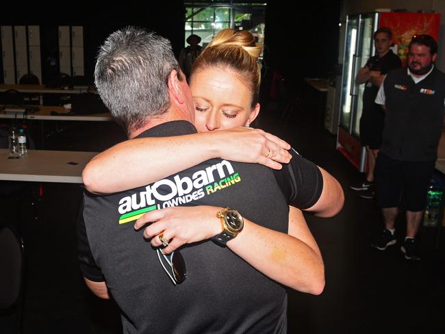 Craig Lowndes kisses his wife Lara after announcing his retirement. Picture: Zak Simmonds