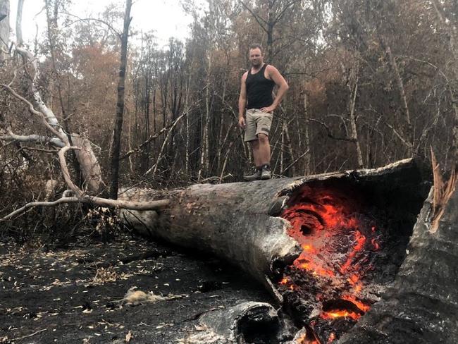 Arlo Ireland on the property the day fire swept through his property.