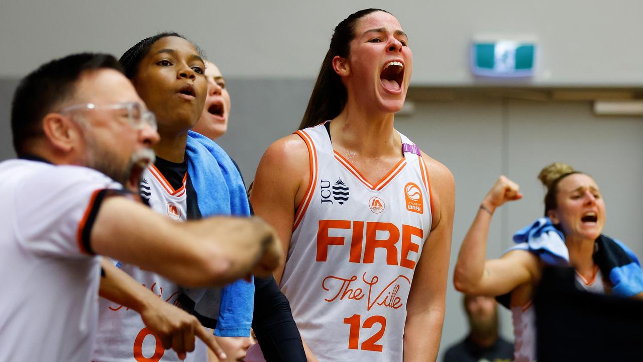 Alex Fowler of the Fire celebrates from the bench during the round two WNBL match between Perth Lynx and Townsville Fire at Bendat Basketball Stadium, on November 06, 2024, in Perth, Australia. (Photo by James Worsfold/Getty Images)