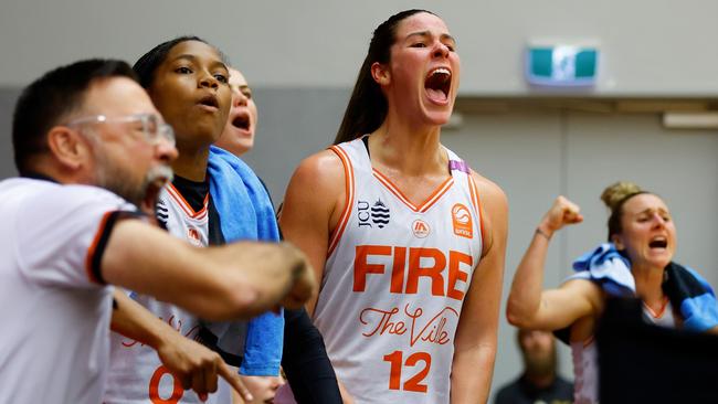 Alex Fowler of the Fire celebrates from the bench during the round two WNBL match between Perth Lynx and Townsville Fire at Bendat Basketball Stadium, on November 06, 2024, in Perth, Australia. (Photo by James Worsfold/Getty Images)