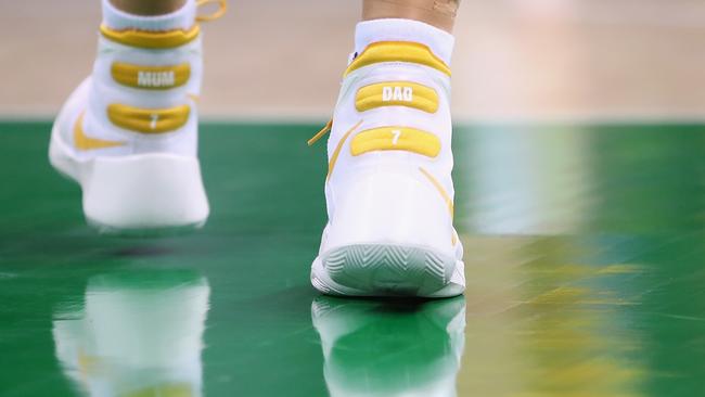 Mum and Dad are seen written on the shoes of Penny Taylor.