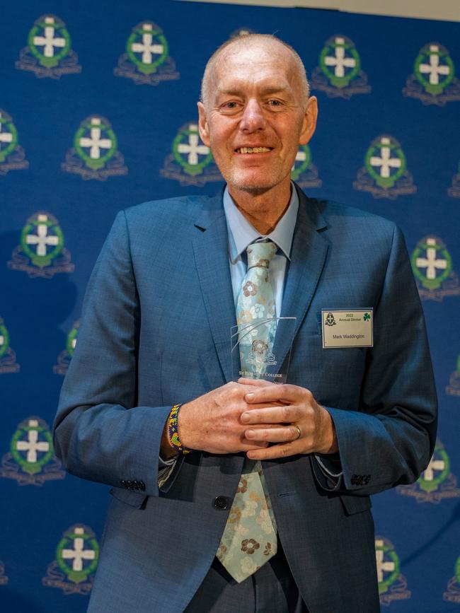 Former St Patrick's College Ballarat director of development and director of boarding Mark Waddington receiving the school's Facere and Docere Award in 2022. Mr Waddington died from lung cancer this week. Picture: St Patrick's College