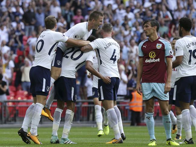 Tottenham players celebrate.