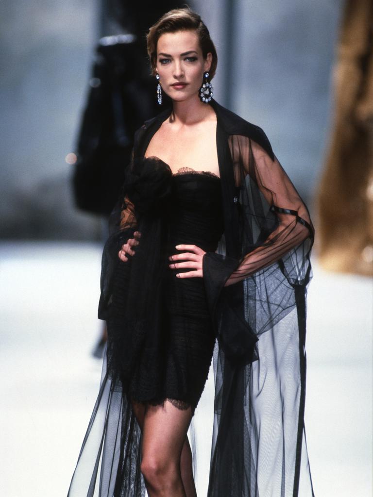 Tatjana Patitz walks the runway during the Chanel Haute Couture show as part of Paris Fashion Week in July, 1991. (Photo by Victor VIRGILE/Gamma-Rapho via Getty Images)