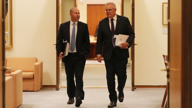 Josh Frydenberg, left, and Scott Morrison at Parliament House in Canberra on Monday. Picture: Adam Taylor