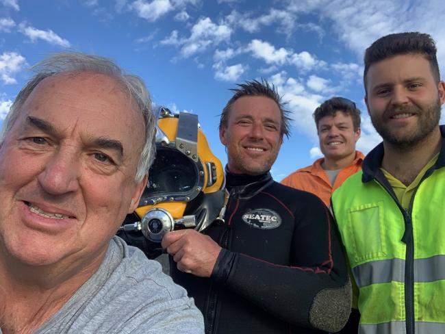 The crew from The Diving Co based in Seaforth that are currently laying NBN optic cable underwater, including across Pittwater to Scotland Island. Left to right: Diving supervisor Mark Dowd, of Avalon; diver Sean Mentieth, of Narrabeen; diver Jared Darcy, of Dee Why; and deckhand Hugo Dowd of Avalon.