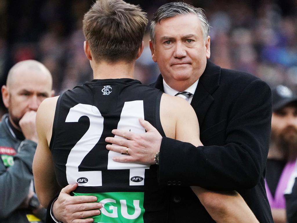 Collingwood president Eddie McGuire hugs Josh Thomas. (Photo by Michael Dodge/AFL Media/Getty Images)